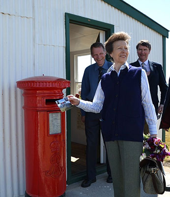 Princess Anne posting postcard